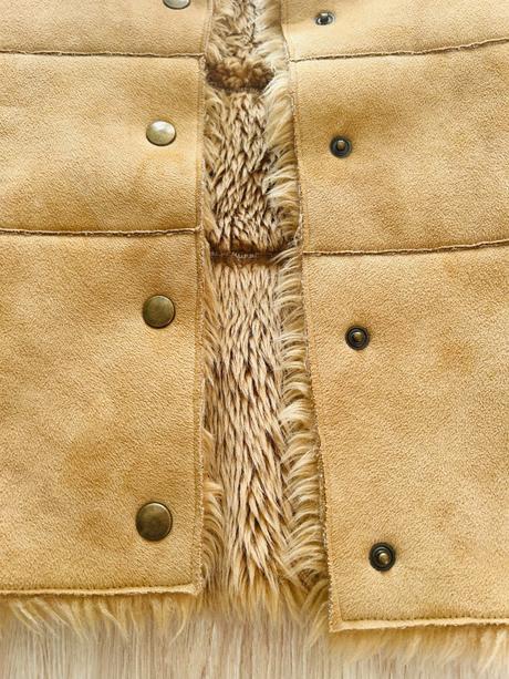 Skvelá kožušinková vesta značky marks & spencer, marks & spencer,116