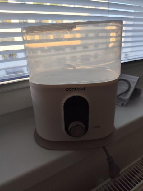 Ohrievačka mlieka a príkrmov concept, 