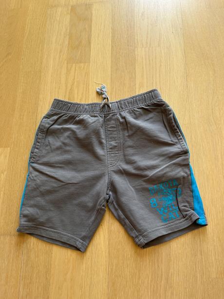 Teplákové kraťasy, 116