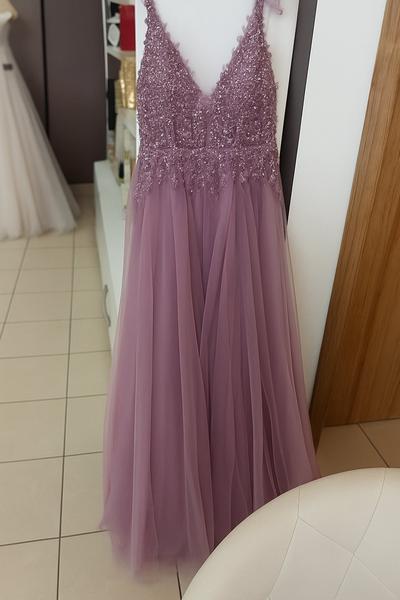 Aká svadobná kytica sa hodí k týmto šatám?