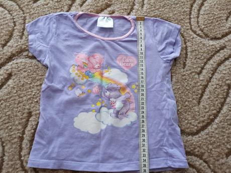 Fialkové tričko, 98
