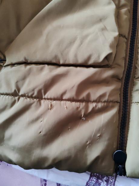 Olivova zimna bunda, 164