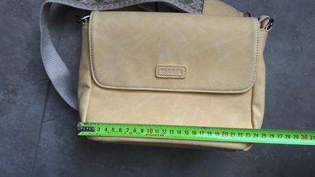Pastelovo zlta crossbody kabelka s krasnym popruho,