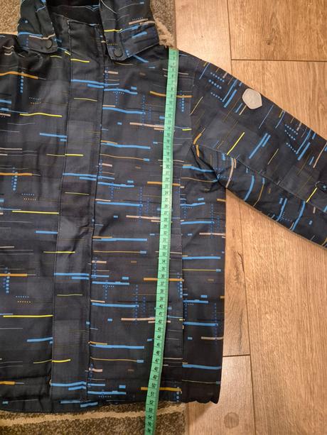 Lyziarska vetrovka, 122