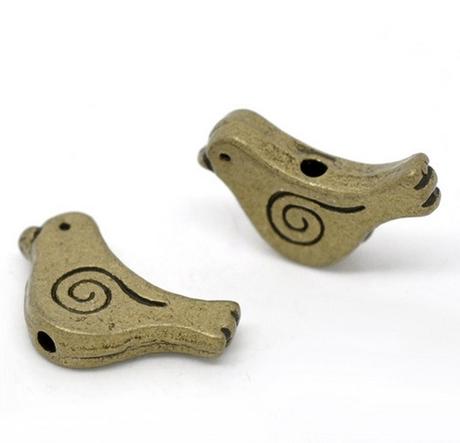 Korálka kovová vtáčik, 