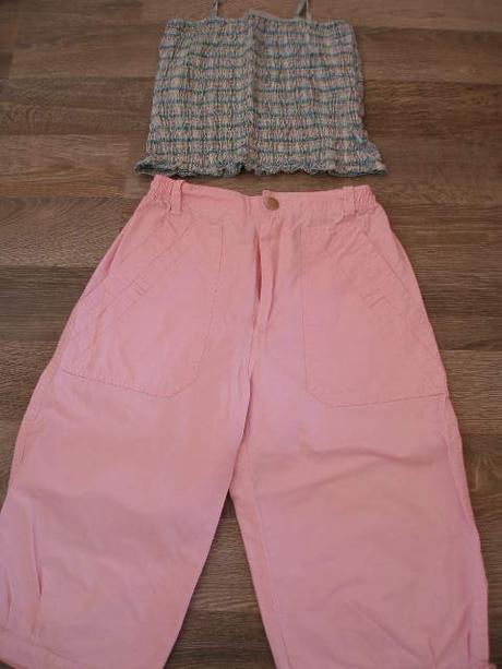 Balík oblečenia, 122–134