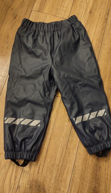 Nohavice do dažďa, lupilu,86