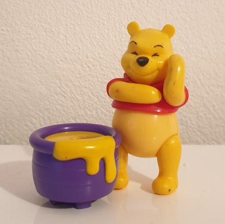 Postavička macko pu s medom,