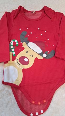 Vianocne bodycko, 86