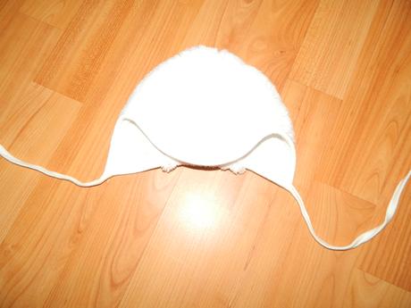 Teplejšia čiapka, 56