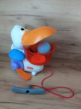 Fisher-price pelikan chodí vydáva zvuky a hrá meló, 