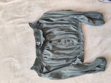 Balík oblečenia zeny, s