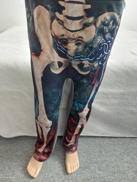 Kostra karnevalový overal + svietiaca maska 152,