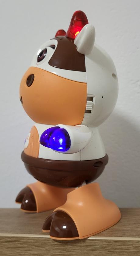 Tancujúca kravička so svetelnými efektami, 