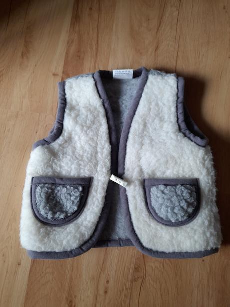Vesta z ovčieho rúna, 98