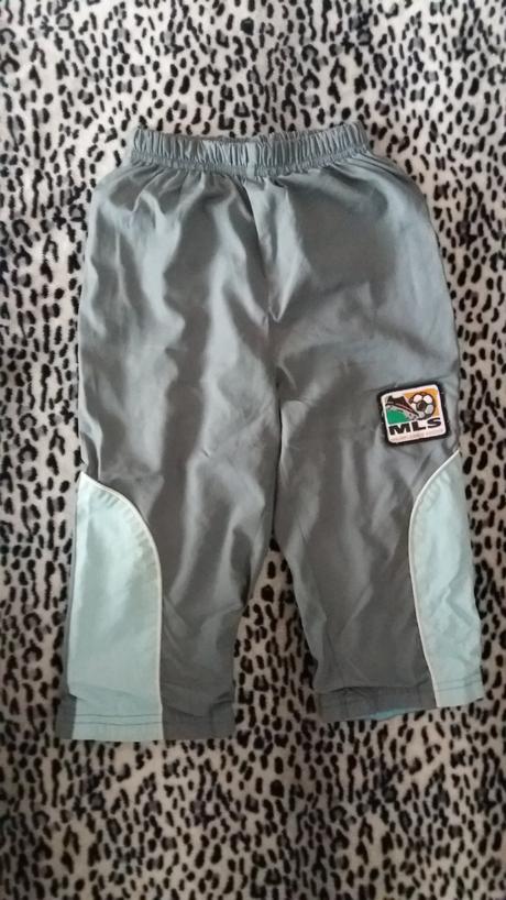 Podšité šušťákové nohavice, 86