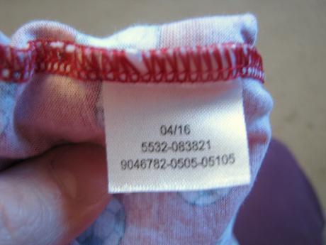 Tielko s futbalovými loptami, 98