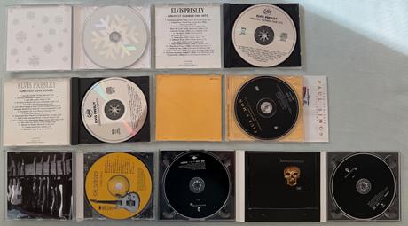 Cdčka elvis,apocalyptica,paul simon a joe satriani, 