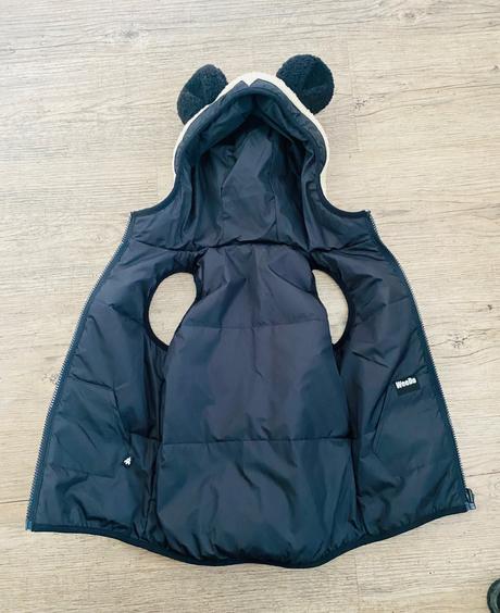 Obojstranná vesta panda, 92