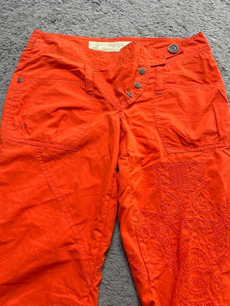 Nohavice oranžové, s