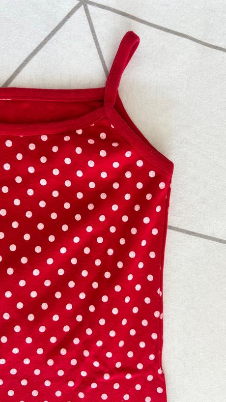 Bodkovaná tunika, 134