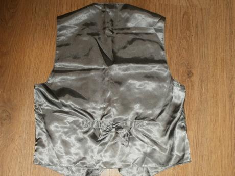 Lesklá vesta canda, l