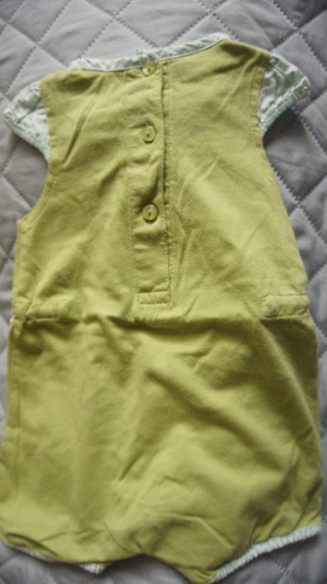 Zelený dievčenský overal, 62
