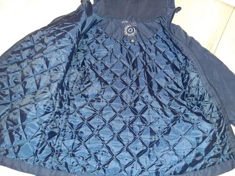 Bunda so šikmím zapínaním sublevel, s