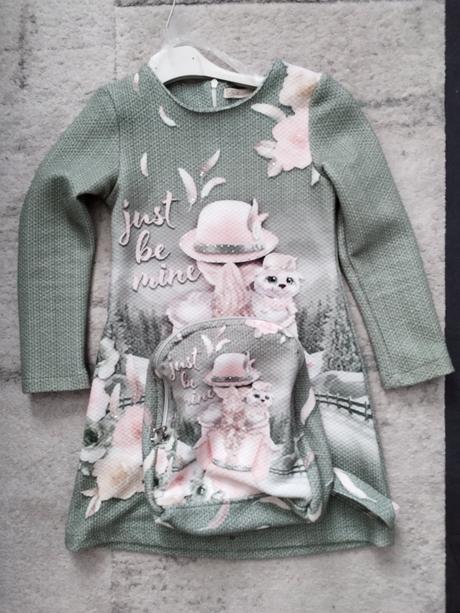 Šaty s batôžkom, 122