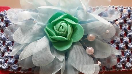 Čelenka s kvetom a ozdobami,