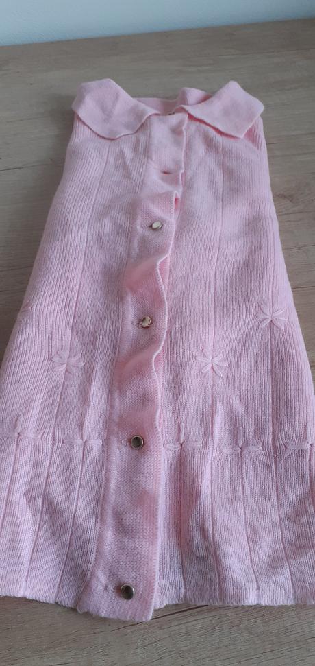 Ružový sveter, 128