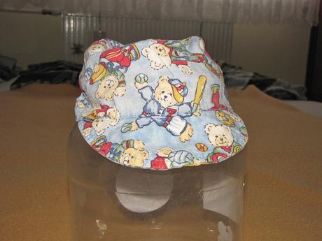 Šiltovka s macíkmi, 74