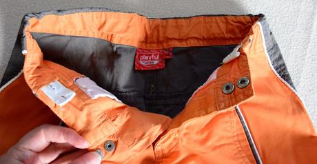 Oranžovo-sivé bermudy, 116