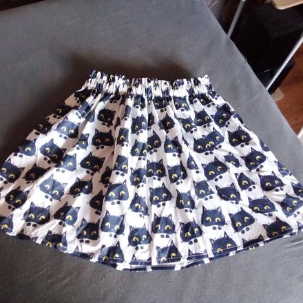 Sukňa s mačkami, 134