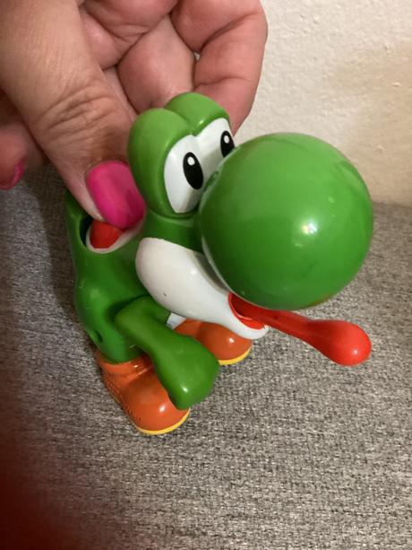 Postavička vyplazujuca jazyk, cca 9 cm,