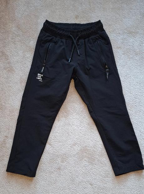 Nohavice športové, 116