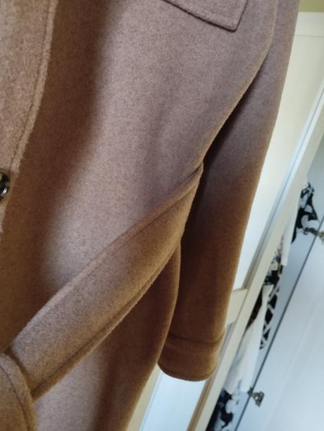 Prechodný kabát, 42