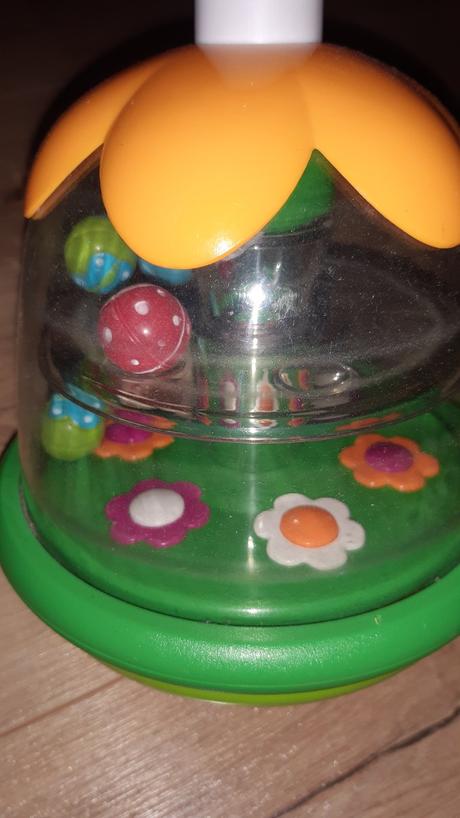 Push and spin carousel hračka na rozvoj zručností, 