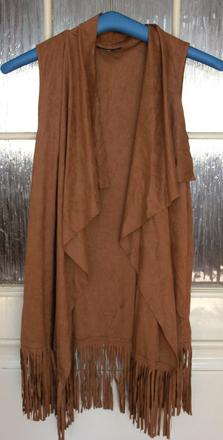 Vesta so strapcami, s