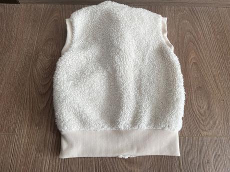 Biela vesta, lupilu,98