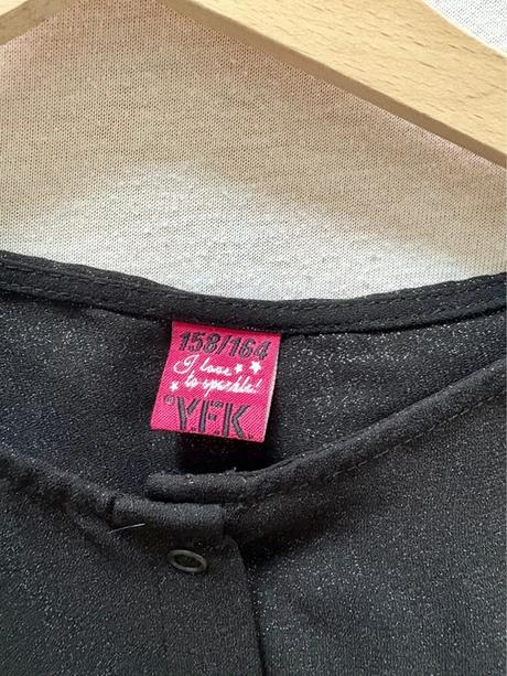 Trblietavý overal, 164