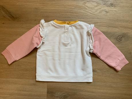 Mikina so slniečkom, 62