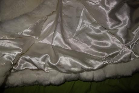 Kozusinkova pelerinka, 98