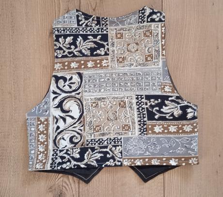 Elegantná vesta, 116