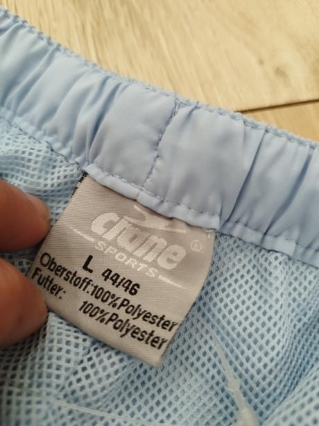 Šušťákové nohavice, l