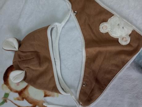 Čiapka a nákrčník, 68