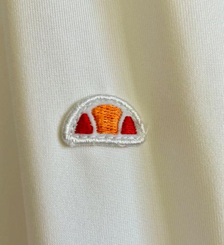 Biele tričko s golierom zn.ellesse č.l, l