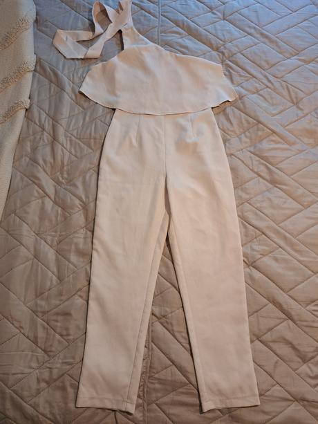 Spoločenský overal, 38