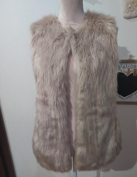 Kožušinova vesta, s