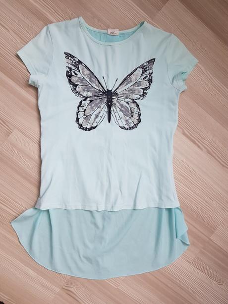 Malo nosena tunika, 164